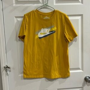 Nike men’s cotton tee. Gold with blue and white trim.  Great condition